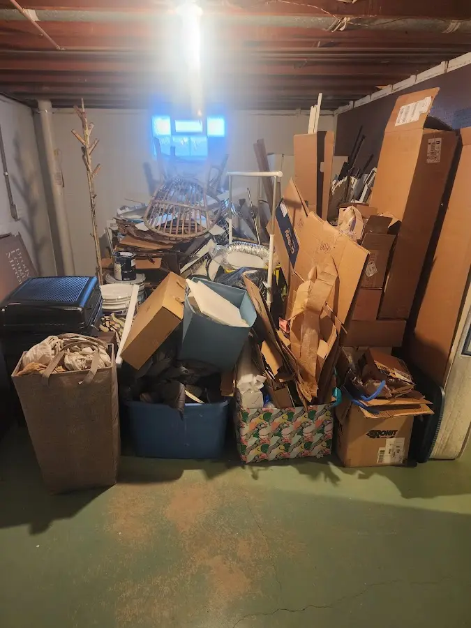 Roll-off dumpster container at job site for 4 Yard Dumpster Rental in Fairway